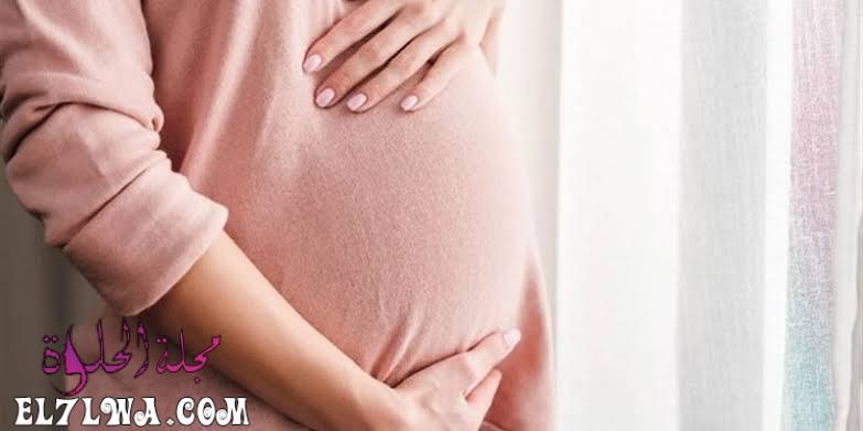 علامات الحمل مع نزول الدورة الشهرية 